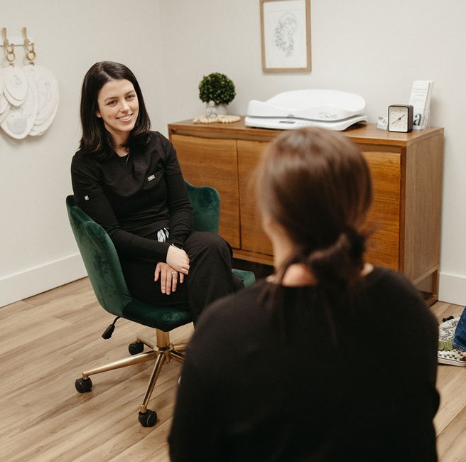 A woman attending a women's care appointment at Alba