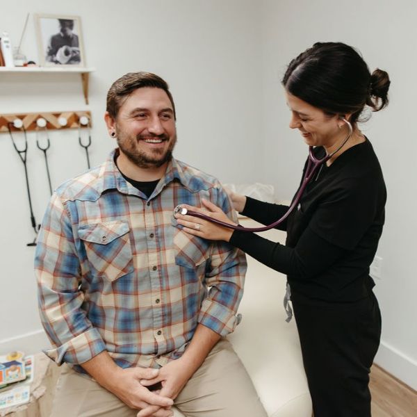 Our men's health specialist examining a patient